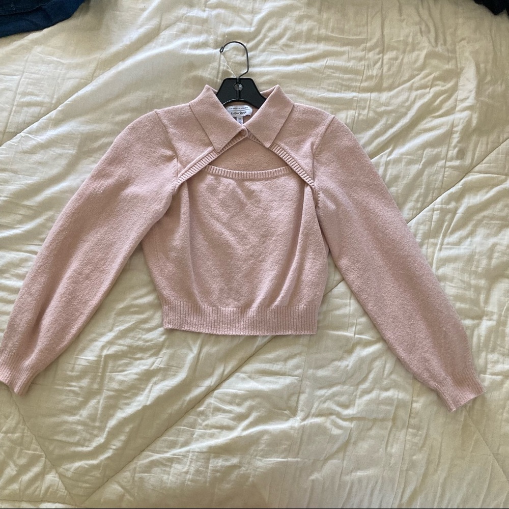 Pink colored sweater